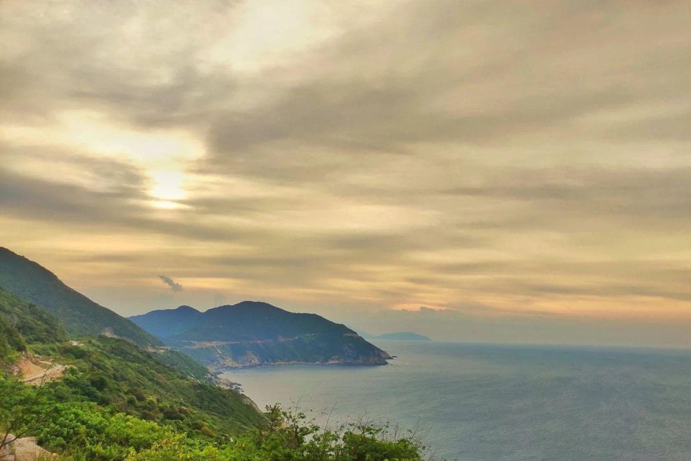 The breathtaking scenery of Windy Strait, with the calm waters and rolling hills, creates a perfect blend of natural beauty
